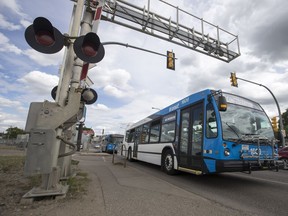 BESTPHOTO  SASKATOON,SK--JUNE 16/2017-0617 news 22nd bus- A City of Saskatoon transit bus crosses the railway tracks near the intersection of  22nd Street West and Avenue F North in Saskatoon, SK on Friday, June 16, 2017. (Saskatoon StarPhoenix/Liam Richards)
Liam Richards, Saskatoon StarPhoenix