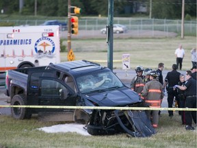 SASKATOON,SK--JUNE 19/2017-Saskatoon Police, Fire and M.D. Ambulance are on the scene of an accident at the corner of Airport Drive and Circle Drive  after a police pursuit  in Saskatoon, SK on Monday, June 19, 2017. The male driver of the suspect vehicle was pronounced deceased at the scene. His identity has not yet been confirmed.(Saskatoon StarPhoenix/Liam Richards)
Liam Richards, Saskatoon StarPhoenix