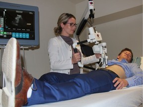 Robotics engineering summer student at the University of Saskatchewan, Richard Gauvreau, gets an ultrasound from Cheri Derksen, a licensed nurse during a demonstration of the MELODY ultrasound system at the University of Saskatchewan Health Sciences Building on Tuesday June 27, 2017. The system, which allows a doctor to conduct a ultrasound from across a room, or from across the province, is the first of its kind in North America and is being called a "game changer" for rural and remote healthcare in Saskatchewan.
