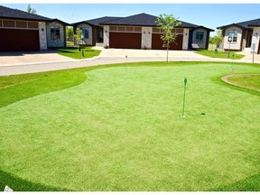 Boychuk Homes has opened its newest show home at Rosewood Estates, located at 12 - 315 Ledingham Drive in Rosewood. The centrepiece of the gated bungalow-style townhome community is a putting green, where residents can sharpen their putting skills. (Photo: Jeannie Armstrong)
