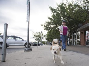 Yvonne Dyck and her dog Lisbon walk near the Farmer's Market in Saskatoon. Lisbon's favourite place is the truck because it takes her to fun places.