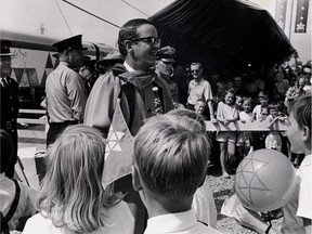 Bandleader Bobby Gimby leads children's choir in singing of his hit tune, "Ca-na-da," at Confederation Train ceremonies.  Photo published Aug. 28, 1967.
Morris Edwards