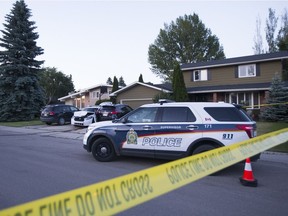 Saskatoon police Const. Allisha Stewart said she was forced to dive back into her police car as a stolen pickup rammed it on June 19, 2017. The cruiser can be seen in the driveway, between two civilian vehicles.