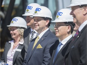 Economy Minister Jeremy Harrison, centre, at the unveiling of Brightenview Development International Inc.'s latest project at the Global Transportation Hub on May 4, 2017.