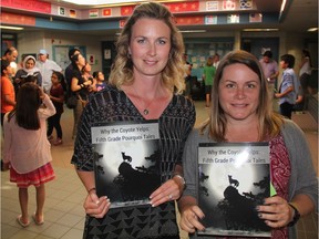 Students and parents at Lakeridge School in Saskatoon gather to celebrate the official launch of a book that was published by the school's Grade 5 class. With help from their teacher Amy Heavin, left, and the school's teacher librarian Jennifer Berthelot the students got the experience the world of publishing first hand, and now, their work is for sale online on Amazon.