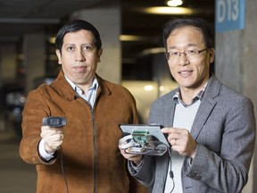 Professor Seok-Bum Ko (right) and student Juan Yepez have worked on new software for "reading" license plates. (Photo by David Stobbe for the University of Saskatchewan)