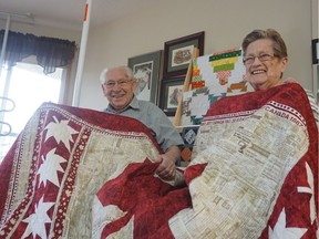 John Friesen and his wife Anne show off the quilt they created for Canada Day in their home on June 22, 2017.