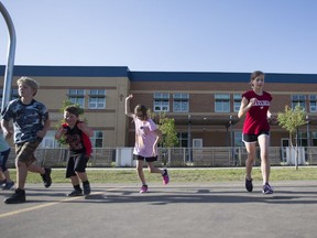 Young athletes run a drill to prepare for the for the Kids of Steel triathlon in Saskatoon, SK on Wednesday, June 7, 2017.