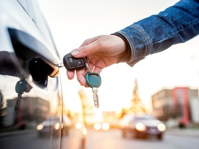 Woman with car key