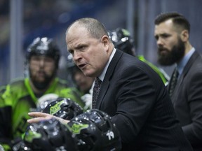 Saskatchewan Rush head coach Derek Keenan talks to his players turing a timeout against the Calgary Roughnecks at the SaskTel Centre in Saskatoon, SK on Saturday, February 25, 2017.