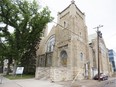 A for sale sign sits in front of the Third Avenue United Church in Saskatoon, SK on Friday, June 9, 2017. A provincial panel is reviewing whether to support special heritage designation and protection for the historic church. (Kayle Neis/Saskatoon StarPhoenix)