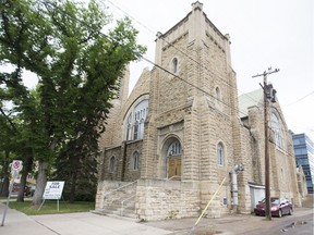 A for sale sign is seen in front of the Third Avenue United Church in Saskatoon, SK on Friday, June 9, 2017.