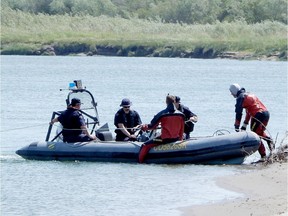 Emergency responders and volunteers were at the Fred Heal canoe launch, roughly 12 kilometres south of Saskatoon, on July 17, 2017 to search for a 17-year-old swimmer who was reported missing on July 16. Andrea Hill / Saskatoon StarPhoenix