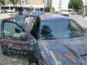 Jeff Janzen hangs out in front of the Bessborough Hotel with his "Signature Series" Crown Victoria on Wednesday, July 19, 2017.