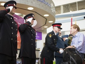 Bob McGrath greets members of Saskatoon's Emergency services, veterans and serving members of Canadian military at the Saskatoon airport ahead of the Wounded Warriors Weekend.