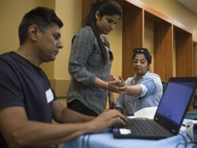 Priya Menon has her blood pressure taken during the Diabetes Canada South Asian Family Day at the SaskTel Soccer Centre.