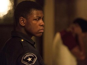 This image released by Annapurna Pictures shows John Boyega in a scene from &ampquot;Detroit.&ampquot; (Francois Duhamel/Annapurna Pictures via AP)