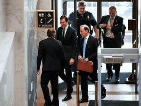 White House senior adviser Jared Kushner, center, accompanied by his attorney Abbe Lowell, arrives on Capitol Hill in Washington, Monday, July 24, 2017, to meet behind closed doors before the Senate Intelligence Committee on the investigation into possible collusion between Russian officials and the Trump campaign. (AP Photo/Jacquelyn Martin)