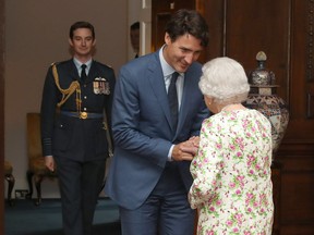 BRITAIN-CANADA-ROYALS

Britain's Queen Elizabeth II greets Canadian Prime Minister Justin Trudeau during an audience at the Palace of Holyroodhouse in Edinburgh on July 5, 2017. / AFP PHOTO / POOL / Andrew MilliganANDREW MILLIGAN/AFP/Getty Images
ANDREW MILLIGAN, AFP/Getty Images