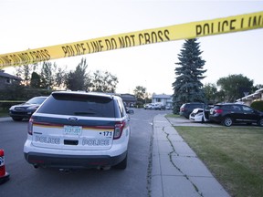 Saskatoon police respond to a scene where a patrol car was damaged on Clearwater Place in Saskatoon, SK on Monday, June 19, 2017. (Saskatoon StarPhoenix/Kayle Neis)