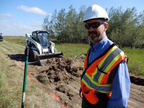Alan Otterbein, the Meewasin Valley Authority's design and development manager, observes work to build a trail system and provide other amenities at Saskatoon's Northeast Swale on Friday, July 14, 2017.