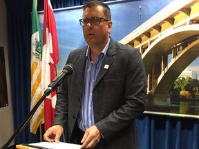 Silverspring-Sutherland MLA Paul Merriman announces the continuation of bus pass funding at Saskatoon City Hall on July 5, 2017.