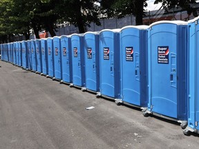 Two youths have told police they did not know a woman was inside a portable toilet when they tipped it during Saskatoon's Canada Day celebrations in Diefenbaker Park
