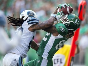 The Roughriders' Naaman Roosevelt makes a 14-yard touchdown catch Saturday against the Toronto Argonauts.
