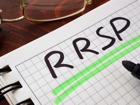 Notebook with  RRSP sign on a table.