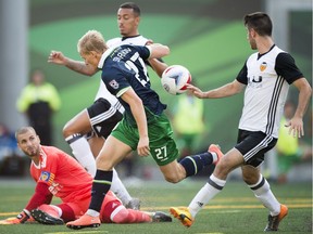 REGINA, SASK :  July 22, 2017  --  The New York Cosmos played the Valencia CF played as part of Soccer Day in Saskatchewan at Mosaic Stadium in Regina.  Cosmos' Eugene Stariov #27 can't get the ball past Valencia CF keeper Jaume Domenech. TROY FLEECE / Regina Leader-Post
TROY FLEECE, Regina Leader-Post