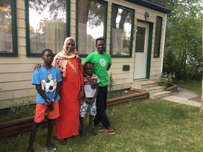 Yann Martel's 'landing pad' house is now home to a Sudanese refugee family: (from left) Abdalaazim Harun, Medina Harun, Mohammed Harun and Malik Harun.