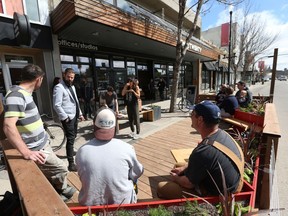 SASKATOON, SK - May 16, 2017 - Shift Development launches their new public parking patio in front of The Two Twenty where all are welcome to enjoy the street, connect with neighbours and host buskers or events in Saskatoon on May 16, 2017.  (Michelle Berg / Saskatoon StarPhoenix)
Michelle Berg, Saskatoon StarPhoenix