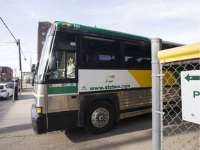 Bus driver Jon Pullman drives the last bus to leave the Saskatchewan Transportation Company's downtown Saskatoon depot on May 31.