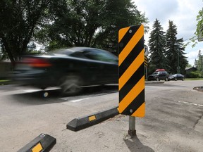 The City of Saskatoon is planning a pilot project to install temporary speed humps, such as this one seen in 2016 on Wilson Crescent, at four locations in 2018. (MICHELLE BERG/The StarPhoenix)