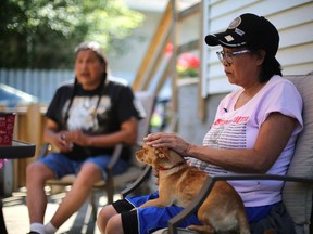 NORTH BATTLEFORD, SK - August 2, 2017 - As the one year anniversary of Colten Boushie's death approaches, Colten Boushie's mother Debbie Baptiste reflects upon the last twelve months, while petting Colten's chihuahua Chico, in Alvin Baptiste's backyard in North Battleford on August 2, 2017. (Michelle Berg / Saskatoon StarPhoenix)
Michelle Berg, Saskatoon StarPhoenix