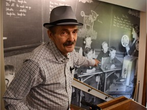 Rudy Kwiatkowski, 80, points to his own picture in a black-and-white mural on the wall of the R.J.D. Williams Building, the former home of Saskatoon's School for the Deaf which he attended as a child.