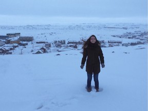 Saskatoon student Afsohneh Amirzadeh stands in the snow in front of Iqaluit during a five-day expedition in March 2017.