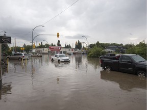 Vehicles stuck in the intersection of Broadway Avenue and Taylor Street after a massive rainstorm in August 2017.