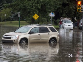 ultiple vehicles stuck in deep water at the intersection of Taylor Street and Broadway Avenue in Saskatoon on Aug. 8, 2017.