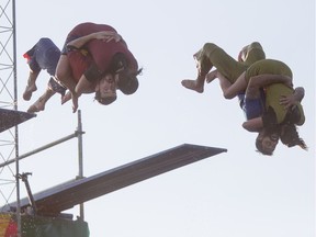 The Flying Fools High Dive Show performs during the Saskatoon Ex at Prairieland Park in Saskatoon.