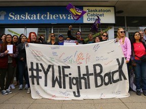 SEIU-West Young Workers committee members and community leaders rally to repeal the Sask Party government's provincial budget outside the Saskatchewan cabinet office in Saskatoon.