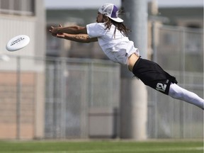 Penguin Village player Marcus Storey dives in but is unable to grab the disk against Spectrum on the opening day of the Canadian mixed ultimate frisbee championship at the SaskTel Soccer Centre in Saskatoon, SK on Thursday, August 24, 2017.