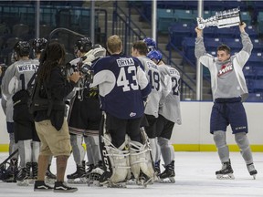 askatoon Blades Team Holtby celebrate their victory over Team Clark during the final of the Kirkness Cup.