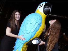 Earls restaurant server Megan Martin, left, and office manager Jacquelyn Rogne are happy to have Big Blue back and that nobody was harmed by a weekend prank in Saskatoon.