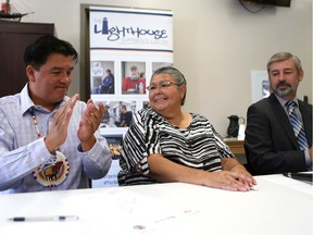 SASKATOON, SK - August 29, 2017 - Chief Bobby Cameron, President Wanda Wilson of the Saskatchewan Indigenous Cultural Centre and Executive Director Don Windels of the Lighthouse sign a memorandum of understanding (MOU) at the Lighthouse in Saskatoon on August 29, 2017. (Michelle Berg / Saskatoon StarPhoenix)
Michelle Berg, Saskatoon StarPhoenix