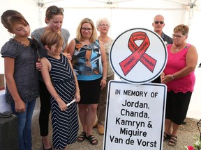 Family members unveil the first official roadside memorial sign for drunk driving victims in Saskatchewan, honouring the Van de Vorst family at the site where they were killed by a drunk driver in January 2016. (Michelle Berg / Saskatoon StarPhoenix)