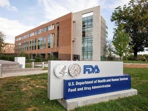 FILE - This Oct. 14, 2015, file photo shows the Food and Drug Administration campus in Silver Spring, Md. The Food and Drug Administration warned a New York fertility doctor on Friday, Aug. 4, 2017, to stop marketing an experimental procedure that uses DNA from three people ‚Äî a mother, a father and an egg donor ‚Äî to avoid certain genetic diseases.