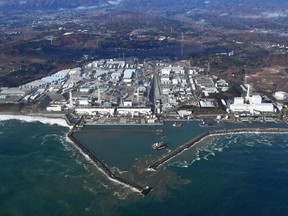 FILE - This Nov. 22, 2016, aerial file photo shows Fukushima Dai-ichi nuclear power plant in Okuma, Fukushima prefecture, Japan. (Kyodo News via AP, File)