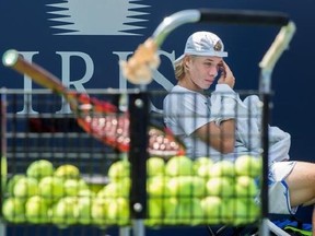 Denis Shapovalov takes a break during a training session as he prepares for the upcoming U.S. Open, Thursday, August 17, 2017 in Montreal. THE CANADIAN PRESS/Paul Chiasson