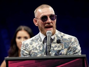 Conor McGregor speaks during a news conference after a super welterweight boxing match against Floyd Mayweather Jr., Sunday, Aug. 27, 2017, in Las Vegas. (AP Photo/Isaac Brekken)